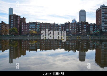 Reflection of the Boston Back Bay skyline in Autumn seen from the Charles River Esplanade Stock Photo