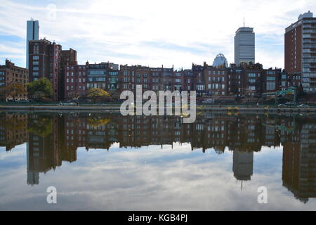 Reflection of the Boston Back Bay skyline in Autumn seen from the Charles River Esplanade Stock Photo