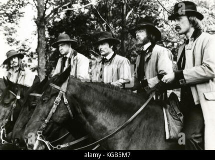 Actors Stacy Keach, James Keach, Randy Quaid, Dannis Quaid, and Keith Carradine in the movie The Long Riders, 1980 Stock Photo