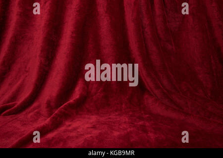 Velvet red draped curtain cloth full frame Stock Photo
