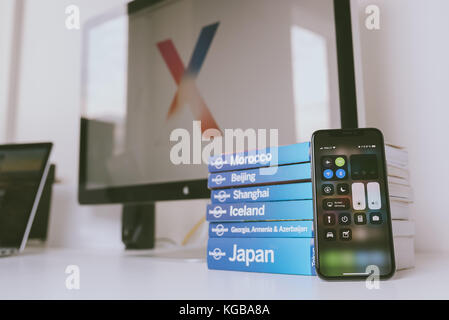 KAUNAS, LITHUANIA - NOVEMBER 05, 2017: New Apple Iphone X flagship smartphone placed on white table. Latest Apple Iphone 10 mobile phone model Stock Photo