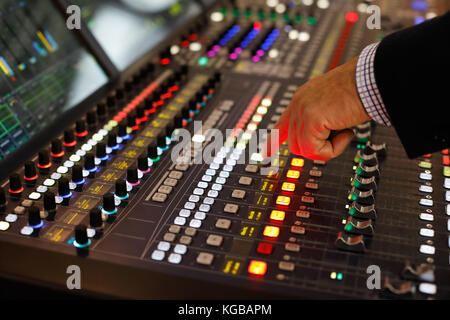 Light and sound engineer controls the console for the stage Stock Photo ...