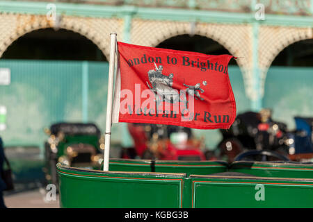 Brighton, UK. 5th November, 2017. London to Brighton Veteran Car Run 2017 showing FLAG ON CAR Credit: stuart price/Alamy Live News Stock Photo