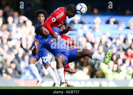 London, UK. 21st Oct, 2017. Michy Batshuayi of Chelsea and Watfords Christian Kabasele during the English Premier League match at the Stamford Bridge Stadium, London. Picture date: 21st October 2017. Credit: Cal Sport Media/Alamy Live News Stock Photo