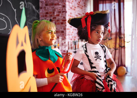 Two girls celebrating Halloween party Stock Photo