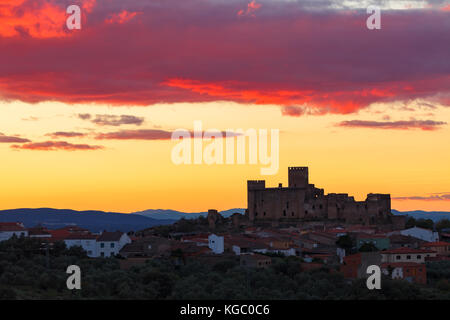 Silhouette of a amazing castle over a yellow sky Stock Photo