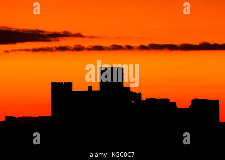 Silhouette of a amazing castle over a red sky Stock Photo