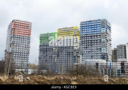 Construction of new homes expands the boundaries of the city. Stock Photo