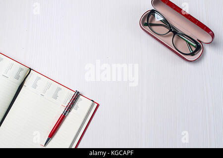 stationery lying on the table. The table in the office. Workplac Stock Photo