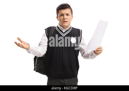 Confused teen student with an exam isolated on white background Stock Photo