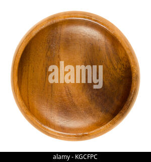Empty wooden bowl. Small brown bowl with wood grain in simple design. Round open-top container for storing food and non-food items. Photo. Stock Photo
