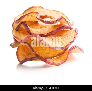 Tasty dried apple slices isolated on white background. Stock Photo