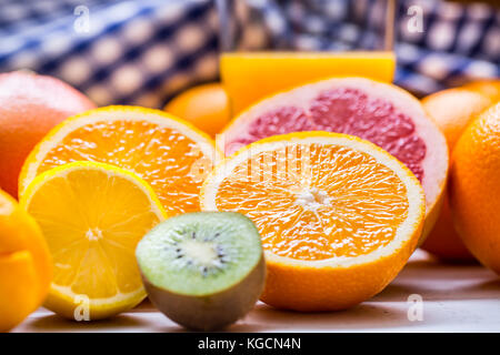 Citrus fresh fruit. Orange grapefruit lemon lime with mint leaves. Stock Photo