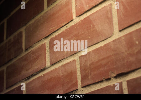 Dimly Lit Brick Wall Stock Photo