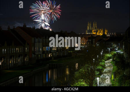 Fireworks display in sky, Beverley Minster, East Yorkshire to launch Flemingate Christmas lights switch on. England, UK Stock Photo