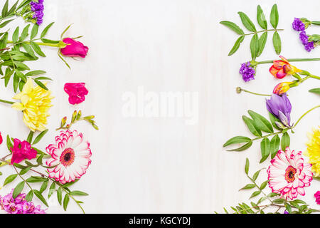 Frame from a variety of spring and summer flowers, space for text Stock Photo