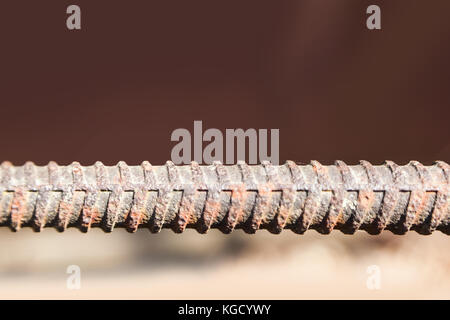 Reinforce steel iron rod. Metal fittings, rebar texture. Closeup macro steel used in construction concrete. Stock Photo