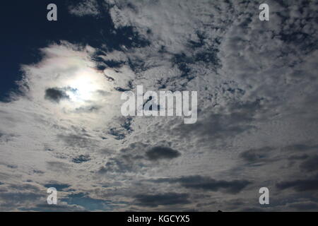 Sky with sun behind cirrus clouds in East Anglia, United Kingdom Stock Photo