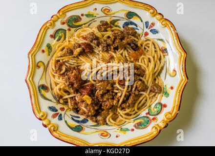 Spaghetti Bolognese in an ornate Italian pasta bowl Stock Photo