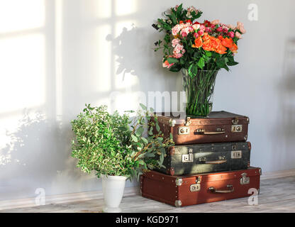 Different flowers in vases for floral workshop in the art studio. Florist's working place Stock Photo