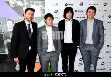 Oli Sykes (second right), Lee Malia (second left), Matt Nicholls (right) and Jordan Fish (left) of Bring Me The Horizon attending the Music Industry Trusts Award in aid of charities Nordoff Robbins and Brit Trust at the Grosvenor House Hotel, London. Stock Photo