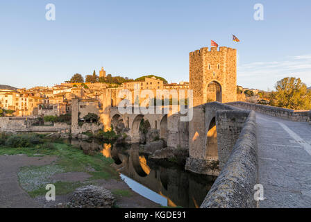 The Medieval Bridge in the ancient town of Besalu at sunrise Stock Photo