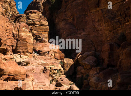 Carved sandstone steps on mountain walking route to Ad Deir, the Monastery, Petra, Jordan, Middle East Stock Photo
