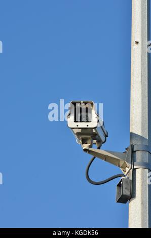 Security camera on lamp post Stock Photo