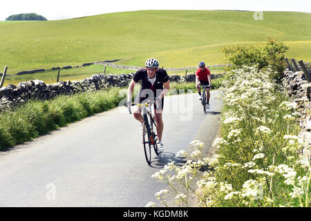 Cycling in the beautiful Yorkshire Dales landscape Stock Photo