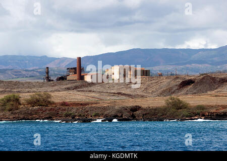 Aerial Kekaha Kauai Hawaii abandoned sugar mill. Old derelict Sugar Mill. Rusty building and equipment. Economy is now tourism based. Farm agriculture Stock Photo