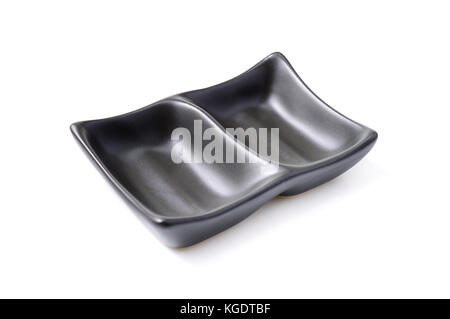 sauce cup on white background, black ceramic sauce cup Stock Photo