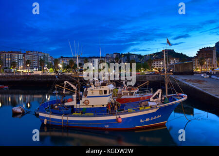 Fishing Boats in Santurce at blue hour, Biscay, Basque Country, Euskadi, Spain, Europe Stock Photo