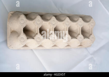 Empty cardboard egg tray for 12 eggs. made from recycled cardboard Stock Photo