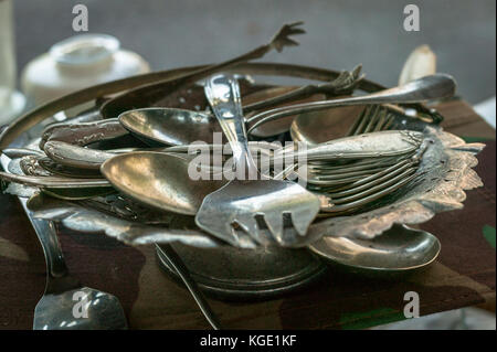 A tray of old cutlery are shown on a local market  in Rio De Janeiro. Stock Photo