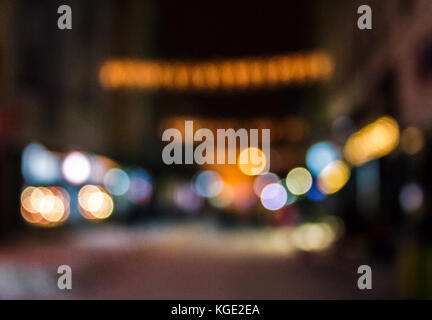 defocused background of city lights on street. lovely winter holidays concept. Stock Photo