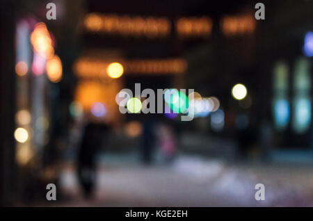 defocused background of city lights on street. lovely winter holidays concept. Stock Photo