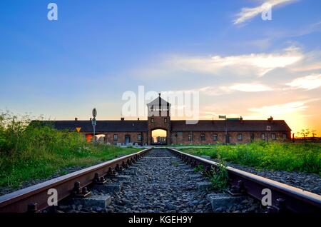 OSWIECIM, POLAND - JULY 29, 2017: The main gate to the concentration camp Auschwitz Birkenau in Oswiecim, Poland. Stock Photo