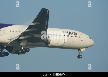 CHIANGMAI , THAILAND- DECEMBER 31 2011: Boeing 777-200 HS-TJA of Thaiairway. Landing to Chiangmai airport from Bangkok Suvarnabhumi. Stock Photo