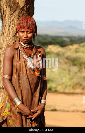 Local Ethiopian people coming back from the market from the Turmi village in the Omo valley in Ethiopia Stock Photo