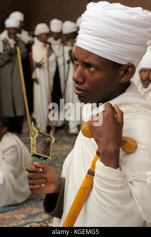 LALIBELA, ETHIOPIA - AUGUST 30: Ethiopian pilgrim is praying in the complex of temples in solid rock in Lalibela, Ethiopia in Lalibela in 2013 Stock Photo