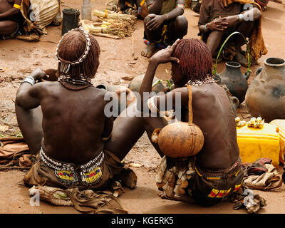 Local Ethiopian people coming back from the market from the Dimeka village in the Omo valley in Ethiopia Stock Photo