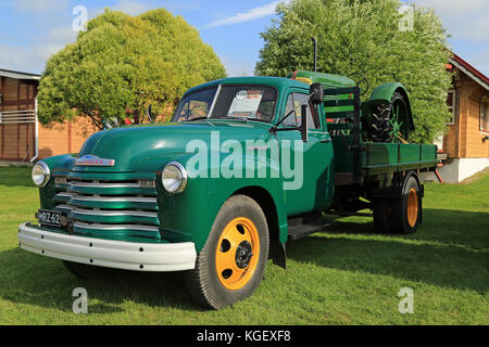 ALAHARMA, FINLAND - AUGUST 8, 2015: Classic Chevrolet 6400 Pickup truck year 1952 and Oliver Standard 70 Agricultural Tractor year 1938 in Power Truck Stock Photo