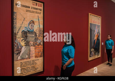 London, UK. 7th Nov, 2017. Lets rebuild Stalingrad by Fedor Anotov and A thunderous blow by the Kukrynisky Collective. Tate Modern's new exhibition Red Star Over Russia on the 100th anniversary of the October Revolution. The exhibition offers a visual history of the Soviet Union, revealing how seismic political events inspired a wave of innovation in art and graphic design.  Credit: Guy Bell/Alamy Live News Stock Photo