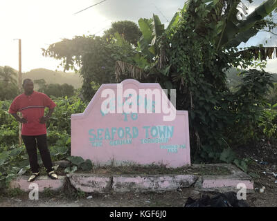 Seaford Town, Jamaica. 22nd Oct, 2017. A stone with the inscription reading «Welcome to Seaford Town - The German Township, founded 1835», at the entrance of the town of 350 inhabitants in Seaford Town, Jamaica, 22 October 2017. Credit: Georg Ismar/dpa/Alamy Live News Stock Photo