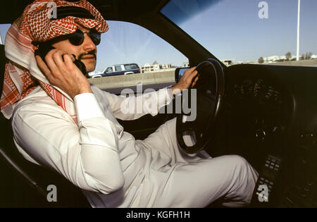 Saudi prince Al-Waleed Bin Talal bin Abdulaziz al Saud, businessman, investor and philanthropist, and member of the Saudi royal family, driving to his palace in Riyadh in 1997.   Al-Waleed was detained November 4th, 2017 in an anti-corruption drive that included at least 10 other princes, four ministers and tens of former ministers, that sent shock waves through the kingdom and the world's major financial centers. Stock Photo