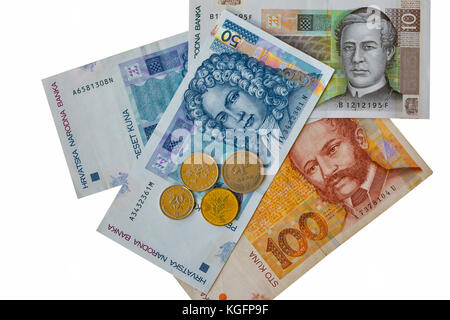 Set of Croatian currency banknotes and coins macro isolated on white with copy space. One hundred, fifty and ten kuna notes. Stock Photo