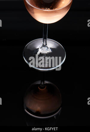 Glass of rose wine on black  background Stock Photo