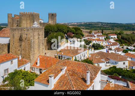 Rooftops of town and Castle. Obidos. Portugal Stock Photo