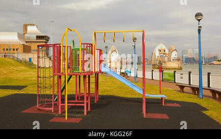 Children's playground the Thames Barrier and Thames Barrier Control Centre, Greenwich, London, United Kingdom Stock Photo