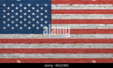 Old grunge vintage American US national flag graffiti over background of white brick wall Stock Photo